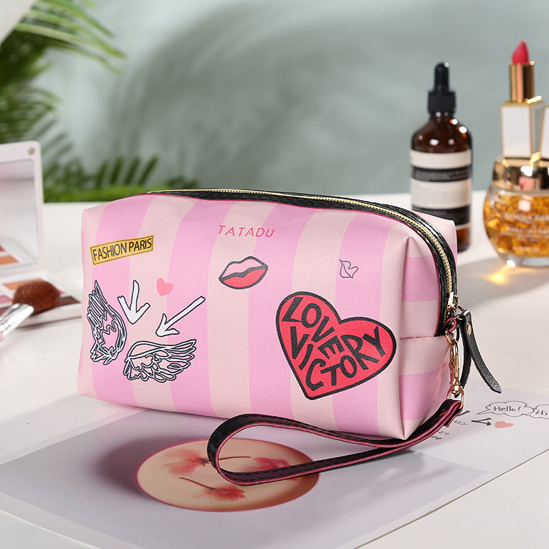 New Product Creative Pillow Cosmetic Bag Fashionable Spray-painted Pu Storage Bag Graffiti Printing Ladies Toiletry Bag